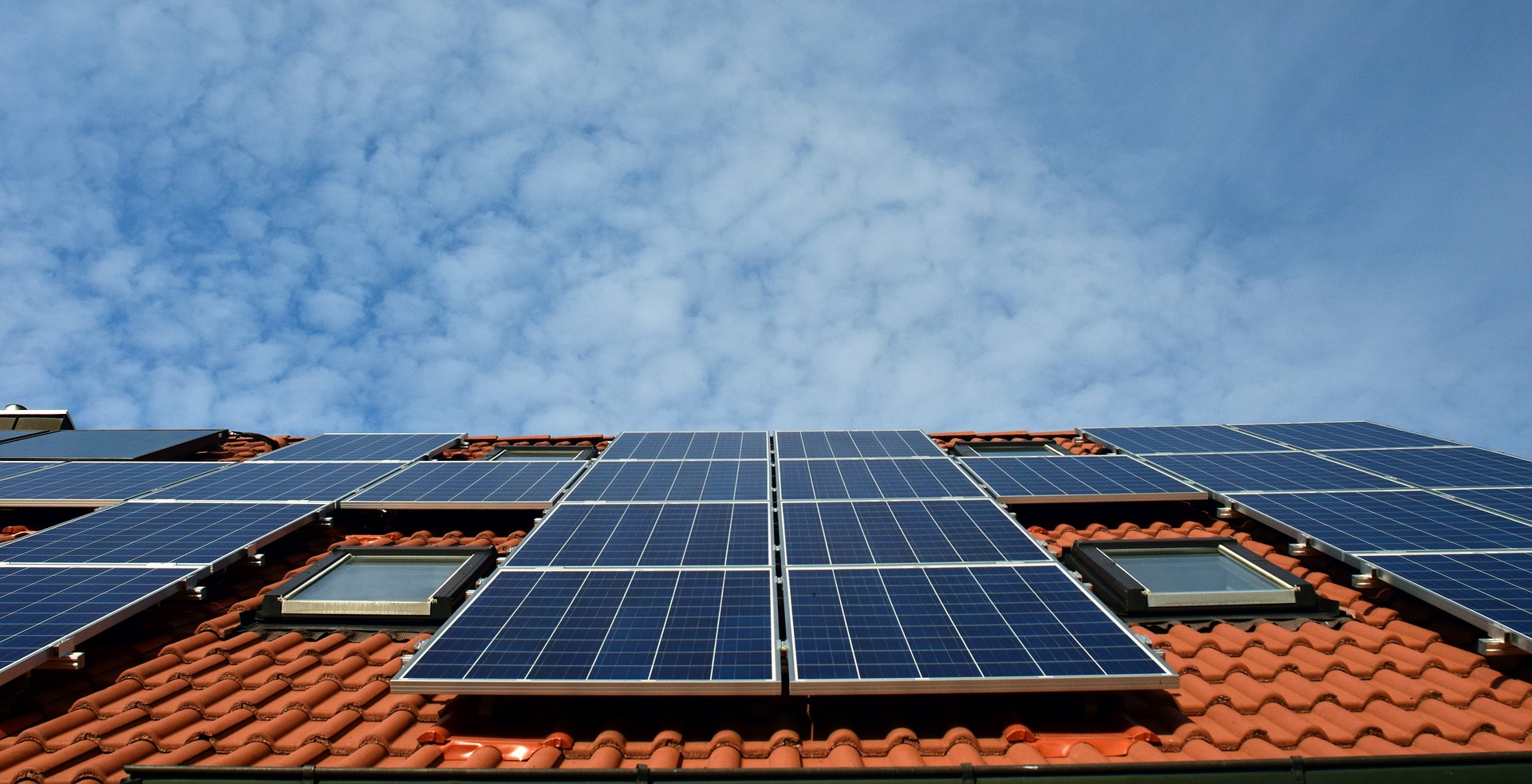 <h3>Rooftop solar energy brings a wide variety of benefits to the grid and to society.</h3><em>Elena Elissena via Shutterstock</em>